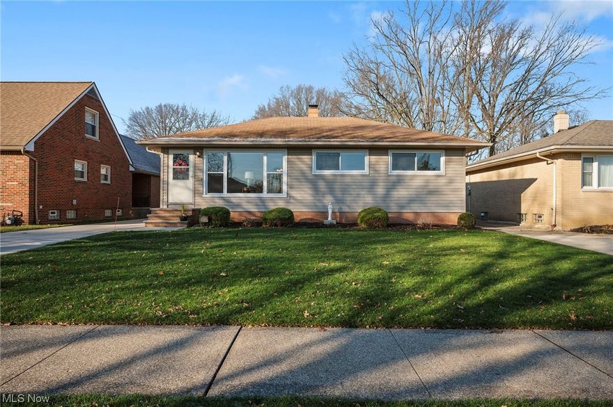 Pristine One Owner Beauty ....  Wonderful Newer Eat-In Kichen with White Cabinets, Undermount Cabinet Lighting, Newer Hardwood Floor, Granite Tops, Stainless Appliances and Large Table Area with Wonderful Backyard View .... Huge-Inviting Living Room With Impressive Cove Style Ceilings, Huge Picture Window and Lots of Natural Light .... 2 Full Bathrooms .... Newer-Gorgeous 1st Floor Main Bathroom With Glass Door Shower Wrapped in Attractive Ceramic Tile .... Bedroom #3 Currently Set as 1st Floor Utility Room That Can Easily Be Converted For Bedroom or Office Use .... Spacious Master Bedroom with Double Windows and Double Closet .... Professionally Painted in Warm Beige Earth-tone with Crisp White Woodwork and Doors .... Hardwood Floors Under All Carpet on 1st Floor .... Double Closet in All Bedrooms .... Expensive White Vinyl Stanek Energy Efficient Windows and Patio Sliding Door .... Security System .... Huge Full Basement with Glass Block Windows ....  Lots of Ready Basement Storage, Plus Abundant Garage Attic Storage .... Enormous 2 1/2 Car Garage (22' x 22') With Extra Concrete Parking Pad and Enormous Rear Concrete Additional Parking Areas .... Newer Concrete Driveway .... Very Desirable Wide Open Rear Lot with Rare Find Setting Backing Toward Sunset Oval and the Woods .... Prime City of Brooklyn Location, Location, Location  ... ZERO $$ DOWN Special Financing - See MLS Attached Details