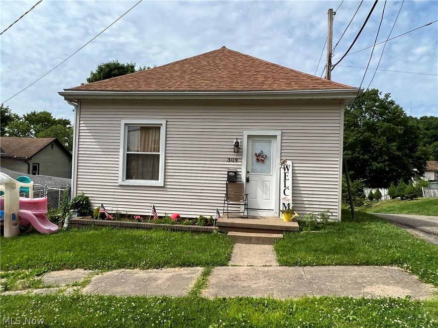 Tastefully remodeled 2 bedroom ranch.  Cozy home provides one floor living.  9' ceilings throughout.  White kitchen includes the appliances.  First floor laundry.  Chain link fenced side yard.  Updates include plumbing, insulation, wiring, drywall, windows, furnace and more.  Window A/C in the master bedroom stays.  Exclude washer and dryer.  Current owner's utilities average $55 for gas, $65 for electric and $60 for water and sewer monthly.