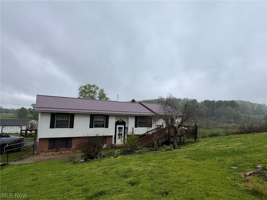 Photo of 4256 Arbor Road NE, Mechanicstown, OH 44651 (MLS # 5204499)