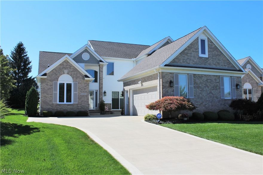 DARE TO COMPARE!!! STUNNING GOLF COURSE SETTING! This home is truly a SHOW STOPPER. The current owners have done extensive updating and have not left a stone unturned.  Enter through the brand new front door to an oversized foyer that spills in to the beautiful great room with soaring 18' ceiling,  3/4" Brazilian Cherry Wood flooring, Gas Fireplace, brand new Triple Pane window with remote controlled power shades that open to panoramic views of the 15th Fairway at Fox Meadows Golf Course. The Great Room is open to the newly updated kitchen with new Luxury Vinyl Flooring, stainless steel appliances, subway tile backsplash and granite counter tops.  The eat in kitchen also includes new light fixtures and new patio doors. Enjoy your evening wine on the custom designed no maintenance resin deck with tempered glass railings and a stylish pergola. First floor Laundry room, oversized garage with service door and a Golf Cart door.  The Formal Dining Room has Brazilian Cherry Wood Floor, new li