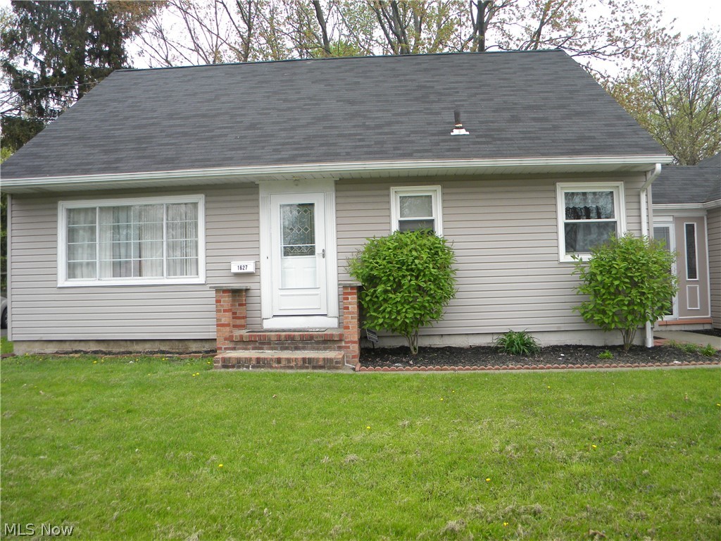 The heart of Cuyahoga Falls, this beautiful cape comes with three large bedrooms. Eat in kitchen and a family room with a large picture window. This home also features finished lower level recreation room for entertaining or family time and office for your files. Vaulted breezeway between a one car garage with large fenced in backyard. Newer gutters with leaf guards (2012), new air conditioner, air humidifier, and ducts (2014). Security system, one year home warranty included schedule a showing today .