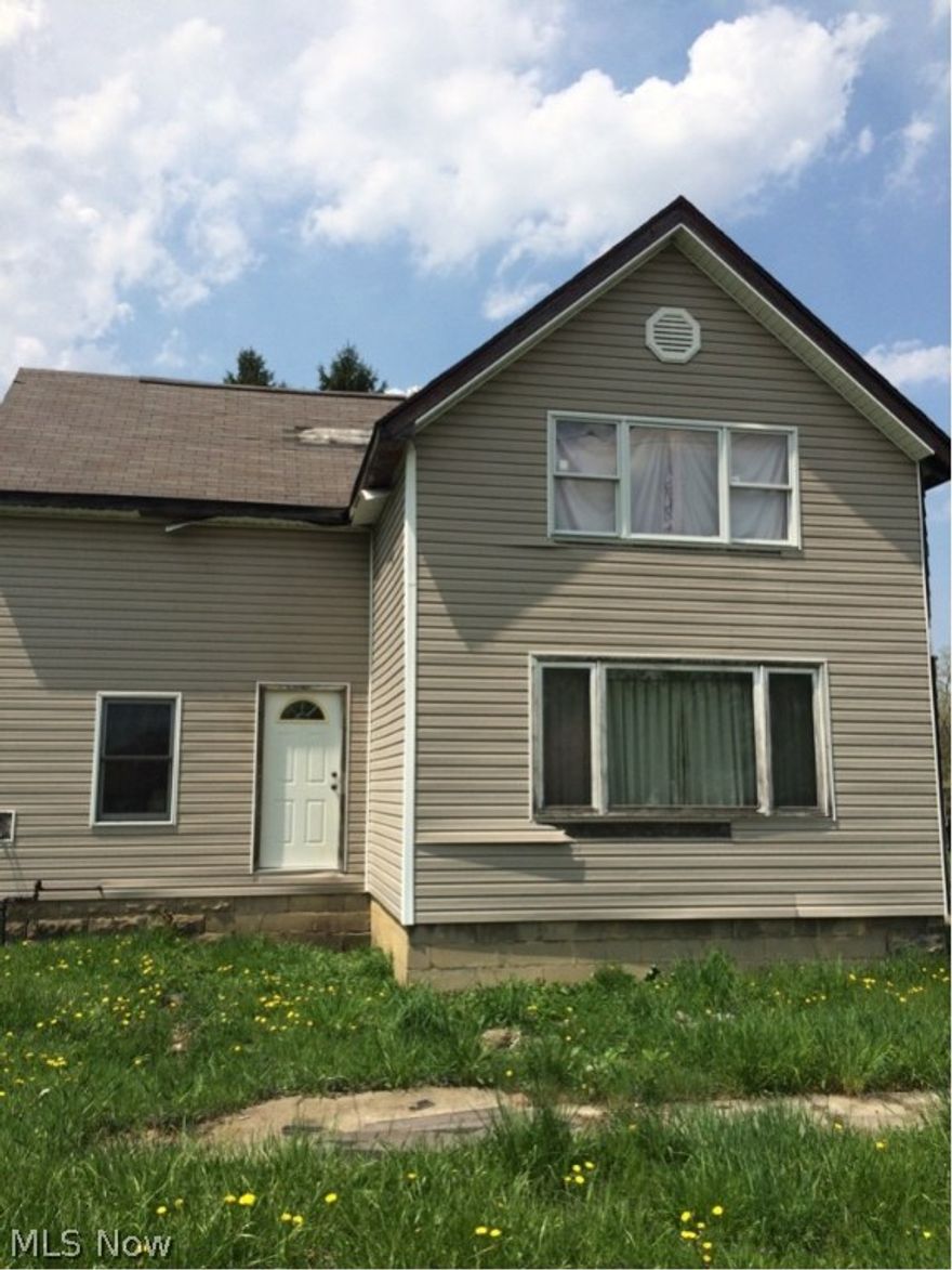 Roomy colonial on over 1/3 acre. Home needs work. Sold as is- Seller will make no repairs. Buyer to assume all City of Bedford Point of Sale violations.