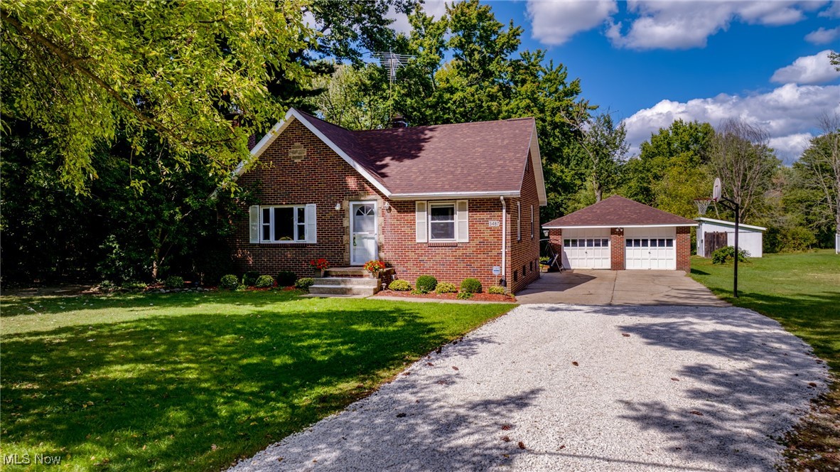 Back on the market! Buyers got cold feet. Their hesitancy is your good fortune! This spacious 1.5-story home has a finished basement with a fireplace, a ton of storage space, AND space to add. Plus, a big yard (9/10 an acre) with a 2-car garage, a small barn with electricity, and a big shed. This picture-perfect, all-brick Cape Cod in Norton is just what you've been looking for! This 1432 sqft home offers a large living room with a wood-burning fireplace, a formal dining room, and a kitchen with updated stainless steel appliances. a large bathroom, 2 ample first-floor bedrooms, an extra large 16x14 second-floor bedroom with a small walk-in closet, a second closet, a built-in linen cupboard, and a doorway to more than 300sqft of clean attic space ready to be finished. Perfect for a second bathroom. Have the master bed and bath of your dreams built to suit! The basement offers another 400 sqft of finished space with a second wood-burning fireplace, plus more than enough space for all your storage needs! Washer & dryer, shelving, dehumidifier, whole house water filter, and upright freezer remain for your convenience. The Predator 9000 watt gas (natural or gasoline) powered portable generator stays too! Updated well equipment, brand new 200 amp electric panel, fireplace recently cleaned, septic pumped in Nov. 2023. Outside you get privacy and serenity on a beautiful green lot with mature trees tucked away off the beaten path. The 2 car garage is perfect place to tool around and satisfy your inner mechanic, the barn, formerly home to two horses, has rough sawn oak walls, electric with gfi, and a loft above for storage. There's also a shed, a brick doghouse, lots of firewood, and the vinyl privacy fence on the eastern boundary is part of the property. The roof is brand new (2024), new gravel (2024), carpets cleaned (2024.) One family has owned this home for 47 years and now with just a few cosmetic updates it is ready to provide a lifetime of memories to a new family.