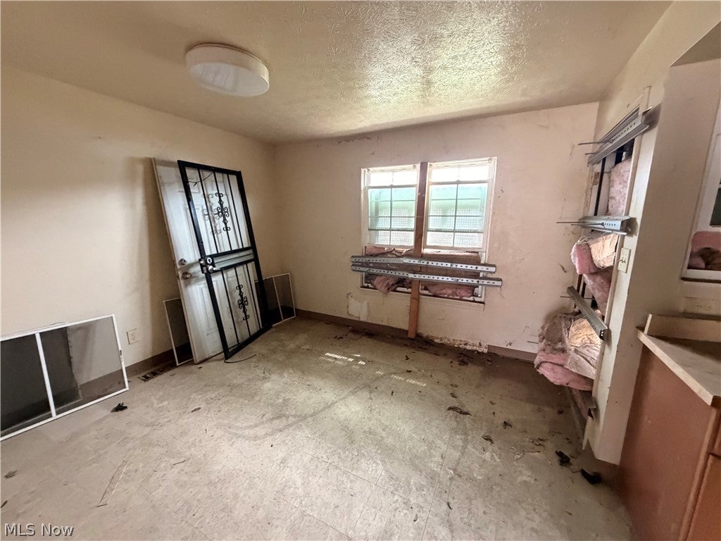 Photo of 9404 Mount Auburn Avenue, Cleveland, OH 44104 (MLS # 5223590)