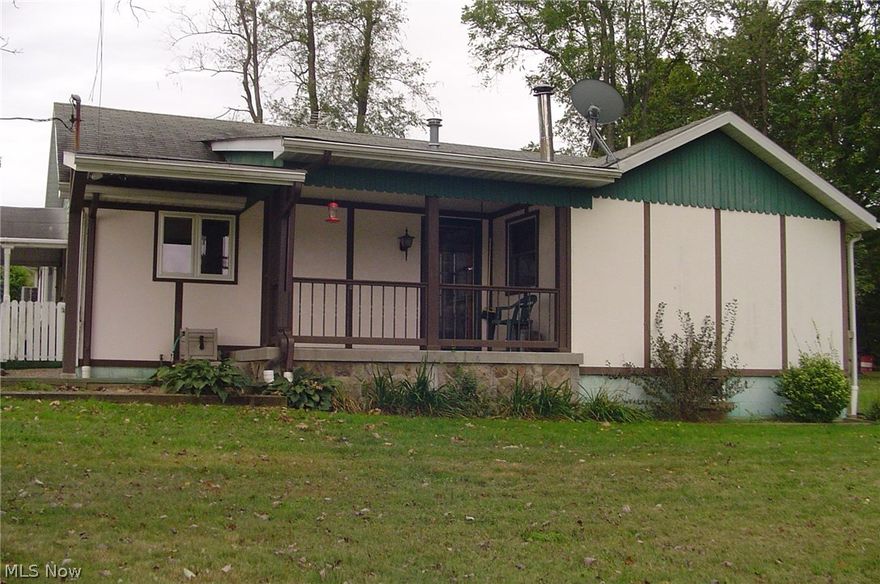 Rural living with plenty of land to roam.  Huge master sweet with half bath.  Living room has a Ben Franklin fireplace and leaded glass front door to porch.  
Kitchen has plenty of counter space and dining area with sliding door to patio.  All appliances stay including washer and dryer. Detached garage. Minerals do not convey.