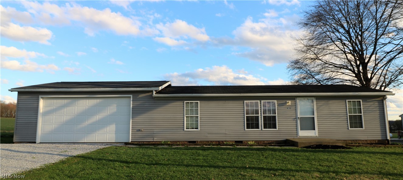 This cozy home features knotty pine walls in the kitchen and living room. Features 3 bedrooms and 2 full bathroom, laundry room and a newer water heater. There is a 2 car attached garage and plenty of outdoor space to add a wonderful deck or patio that would overlook the open views on the backside of the home. Come check out this little gem in the country that is close to in town conveniences.