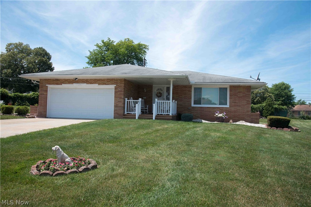 Welcome home to this all brick ranch located a short walk to North Park in Seven Hills with a picnic pavilion, playground and ball field. Enjoy the seasons on the new front porch or the sunny patio located off the family room. A spacious kitchen with Maple cabinetry and an island for comfortable living and entertaining! Three bedrooms and one and a half baths. The beautiful wood-burning fireplace in the family room will make for cozy gatherings during the cold weather months. This home features a first floor laundry room located just off the family room for convenience. A secondary laundry hook-up is available in the basement. The basement has a separate room for an office, craft, or exercise room. A large area for a lower level family room and a separate workbench area with plenty of storage complete the basement. All appliances will stay, including the freezer in the basement. Updates include: Champion windows (2010), Updated electrical (2010), Hot water tank (2015), Garage door (2