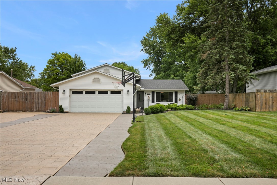 Welcome to your North Ridgeville retreat! This updated 3-bedroom, 2-bath home offers an open floor plan with two spacious living areas, perfect for everyday living and entertaining. Enjoy peace of mind with a new roof, new gutters, and a whole-home generator—plus a furnace updated in 2014 and a tankless hot water heater for added efficiency.
Step outside to your oversized stamped concrete driveway, offering plenty of parking and curb appeal. The property features two garages—one attached for convenience and one detached garage that is perfect for a workshop, ideal for hobbyists or extra storage. This home is move-in ready with thoughtful upgrades throughout and space for the whole family to spread out and enjoy.
Located in the heart of North Ridgeville, you’ll love the blend of comfort, function, and location this home delivers. Contact your fave realtor TODAY for your personal tour.