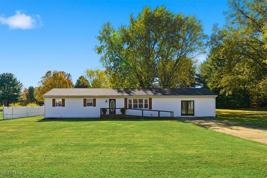 Nestled on a tranquil parcel in Ravenna Township, this beautifully updated 3-bedroom, 2-bath ranch offers the perfect blend of peaceful living and modern comfort. The exterior features brand-new vertical siding, giving the home a fresh, contemporary look that complements its serene surroundings.

Step inside to find new carpet and luxury vinyl plank flooring throughout. Along with many other thoughtful updates, creating a warm and inviting atmosphere. The massive great room is the centerpiece of the home—an ideal space for entertaining and family gatherings of any size. A convenient first-floor laundry adds to the easy, single-level living design.

Car enthusiasts and hobbyists alike will love the spacious four-car garage, offering plenty of room for vehicles, tools, and storage. Out back, enjoy peaceful views as your property backs directly up to Windmill Golf Course, providing both privacy and a beautiful natural backdrop.

This Ravenna Township gem combines thoughtful updates, generous space, and a one-of-a-kind setting, a perfect place to call home.