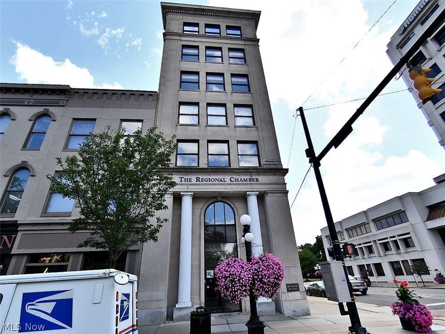 Downtown Warren Condo with stunning views! Enjoy breathtaking views of Courthouse Square from this beautifully maintained sixth-floor condo in the historic Mahoning Building. This spacious 2 bedroom, 1.5 bath unit perfectly blends historic charm with modern conveniences, having been completely renovated in 2018.  The gorgeous kitchen features granite countertops, stainless steel appliances, and ceramic tile flooring, creating a stylish and functional space for cooking and entertaining. Both generously sized bedrooms offer comfort and space, complemented by oversized bathrooms. Large picture windows fill the home with natural light while providing beautiful views of the Mahoning River and the nearby Warren Community Amphitheatre.  A security elevator takes you to this fantastic condo. Additional highlights include: Two designated parking spaces in the deck directly behind the building. Meticulously maintained interior.  Walking distance to restaurants, shops and entertainment around Courthouse Square. Carefree living with no HOA fee. Water and trash included at no charge.  this unique downtown property offers charm, convenience, and spectacular views all in one. Schedule your private showing today and experience downtown living at its best!