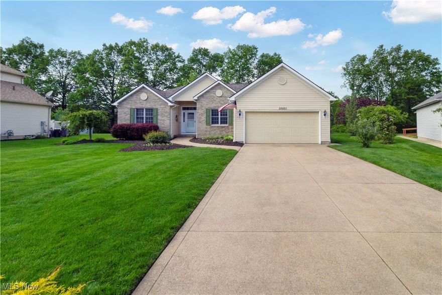 Welcome to this spacious 3-bedroom, 2.5-bath ranch in sought-after Olmsted Township NO INCOME TAX! With just over 2,000 square feet, this home offers generous living space and fantastic potential. Step inside to find fresh neutral paint, a bright living room with vaulted ceilings, and a cozy fireplace perfect for chilly evenings. The kitchen features classic oak cabinetry paired with granite countertops, offering a nice blend of traditional style and modern touches. A brand-new full tear-off roof provides peace of mind, and the great curb appeal sets the tone before you even step inside. Downstairs, you'll find a full unfinished basement already plumbed for a full bath—a perfect opportunity to add instant value with future finishing. The large, private yard with deck offers space to relax, garden, or entertain.