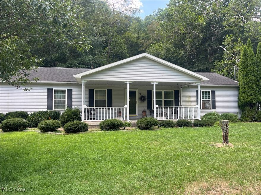 Beautiful Ranch in wooded subdivision! Home has 3 bedrooms/2 full baths, large living room, family room with gas fireplace, eat-in kitchen with breakfast bar, adjoining dining room, large master suite with master bath featuring garden tub, double sinks and separate shower, fenced back yard, 2 car attached garage, nice year round sunroom, 2 storage sheds in the back yard! Paved driveway and large covered front porch to enjoy those sunny days! This home is very spacious with so much to offer your family!