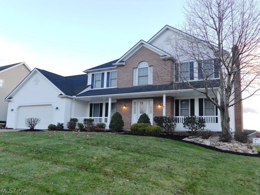 Wonderful & spacious 4 bedroom, 2.5 bath, colonial with many extras!  Foyer entry w/ceramic tile.  Formal living room with French doors.  Beautiful family room w/brick gas fireplace open to large kitchen & dinette area complete w/granite countertops & wood flooring.  Lovely formal dining room also with wood flooring.  Half bath & 1st floor laundry complete the main level.  Master bedroom w/master bath features soaking tub & separate shower.  3 more bedrooms & full bath complete the 2nd level.  Must see fabulous finished lower level offering family/media room, rec room w/bar area & pool table, office area or exercise room plus utility room with storage.  Nice landscaping & outdoor entertaining made easy w/large composite deck & relaxing water feature. 2+ car garage & extra storage & additional parking pad.  Fresh paint & new carpet throughout.