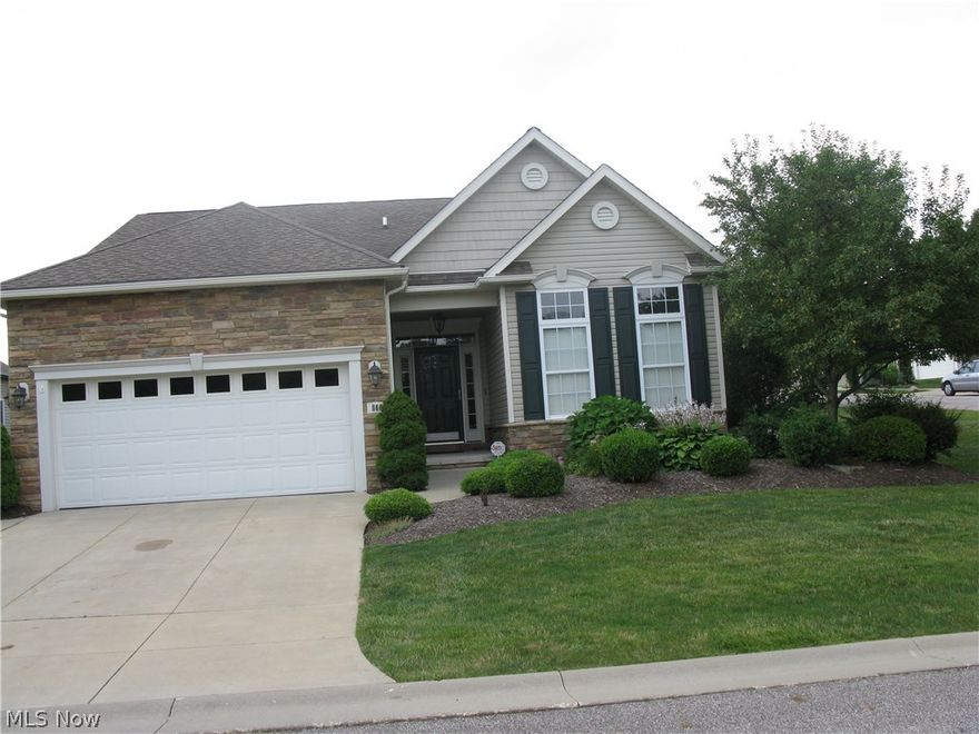 Beautifully appointed 3 bedroom, 3 full bath home situated in the quaint subdivision of Heron Crest. Gracious entrance foyer w/columns leads you into the vaulted great room with fireplace, arched windows, and a walk out to a fabulous stone paved patio with stone walls and park like landscaping. Open kitchen & dining area w/stainless steel appliances & cherry cabinetry. Guest bedroom & full bath on the main floor. Office w/glass French door & hardwood flooring & crown molding. Large master on first floor w/a glamour bath, large walk in closet. Full bedroom, full bath upstairs & an ample sized loft overlooking the great room and kitchen. Bedrooms and great room have ceiling fans, tastefully painted walls, and some stacked moldings. Basement is full footprint of home with a crawl space for storage. Plumbing is in place if the need is there for a bathroom, & high ceilings to finish basement.