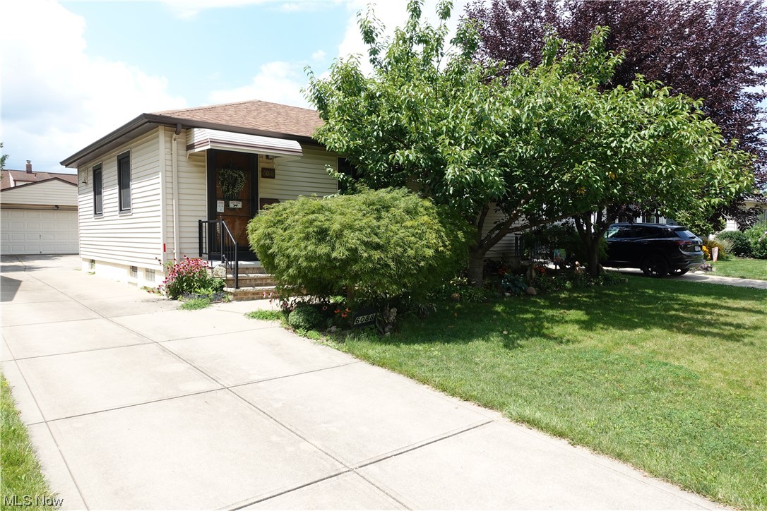 Very well cared for ranch in Brook Park is ready for your finishing touches. The kitchen has been updated with shaker style cabinetry, and granite counters. All appliances stay. The living room has a stone fireplace with electric insert and a beautiful shiplap focal wall. Hardwood floors have been refinished. The full bath has been completely remodeled with modern decor and an oversized shower. Three bedrooms complete the first floor living space, just needing paint to suit your needs and taste. Half of the basement allows for additional living space and is perfect for a place to relax or entertain. The roof, siding and most windows have been replaced. The detached two car garage has nature stone flooring, and the backyard is fenced with ornamental steel fencing. Schedule a private showing before it is too late.