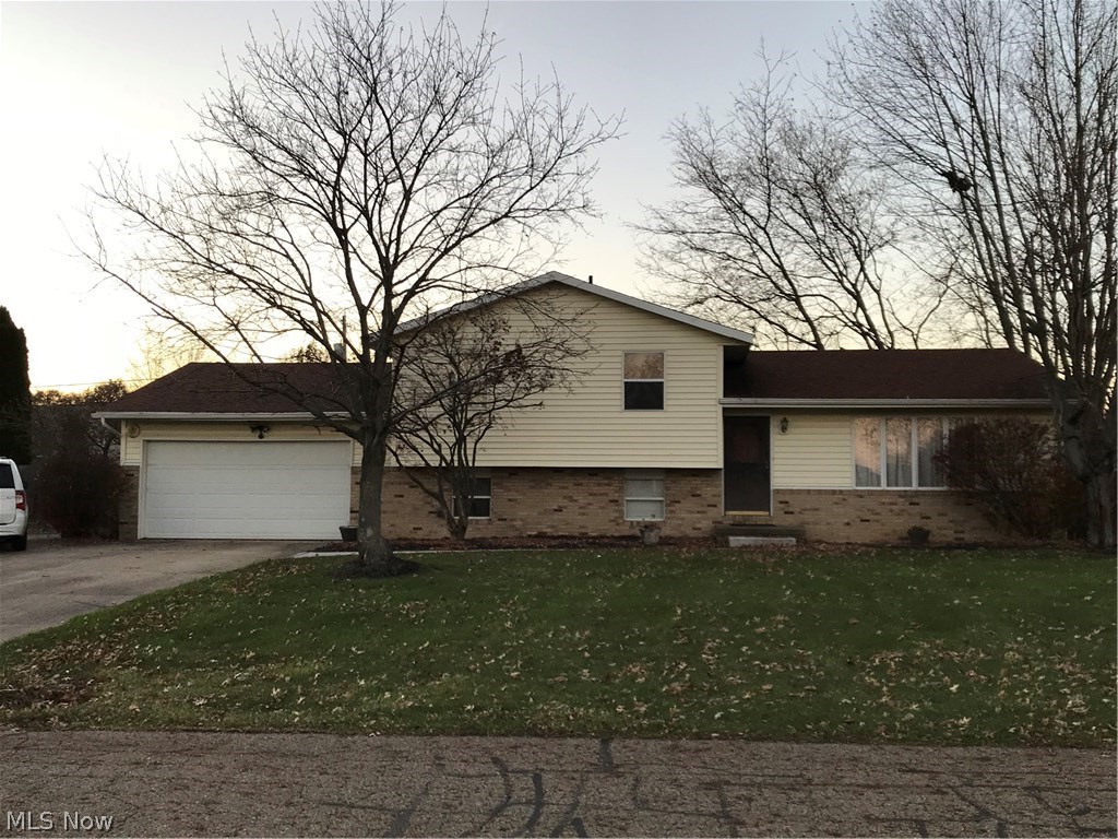 Excellent value in the spacious 4 level split. Kitchen has been updated and includes granite countertops, hickory cabinets with pull out shelving, sizable pantry, stainless steel appliances, tin back splash, and ceramic flooring. Also featured is a large living room and roomy eating area that is accented by a French door that leads to the deck and 16 x 30 patio. The two full bathrooms have both been renovated. A nicely sized family room is an additional entertainment area. The electrical box has been updated and the roof is approximately 7 years old. A two car attached garage, fenced yard and a sizable shed are also included. Due to an accident, the seller was not able to complete updates and home is being sold as-is. This is the perfect opportunity to enjoy the current updates and finish it off with your own choices. Call for your private showing today!!!