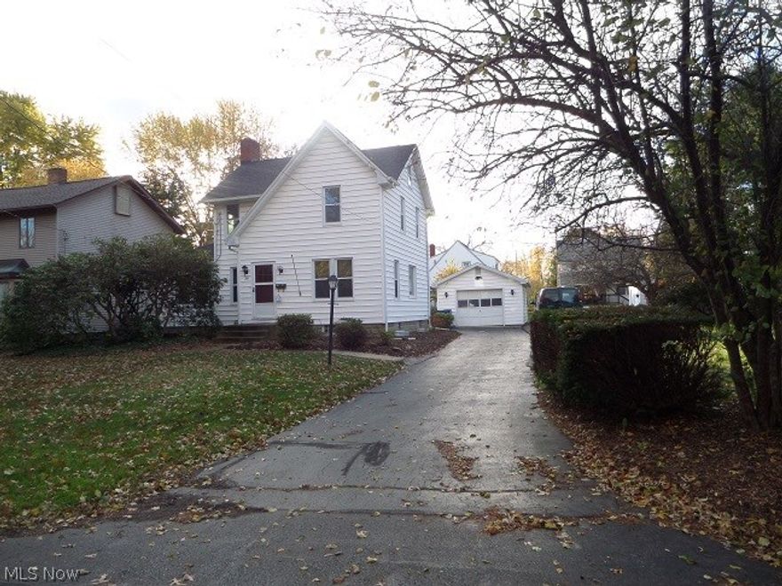 Let's get you moved in before the Holidays! If you are looking for a home that has the potential for 4-5 bedrooms than this is it!  Owner just put all new carpeting through out the home and freshly painted the interior! It is move in ready with immediate occupancy! There are three bedrooms upstairs and a first floor room that can be used as a library, bedroom or family rm. It has gorgeous built in shelving and a closet. There is a formal dining rm and large living room with a very pretty fireplace! Full basement offers another full bath, rec room or bdrm, storage room and open access to the hot water heater, furnace and electrical box. As a bonus there is an extra lot, paved driveway and detached garage! Enclosed rear porch is a great place to kick off your muddy shoes! This home is within walking distance to down town Newton falls! This home qualifies for USDA 0% down!