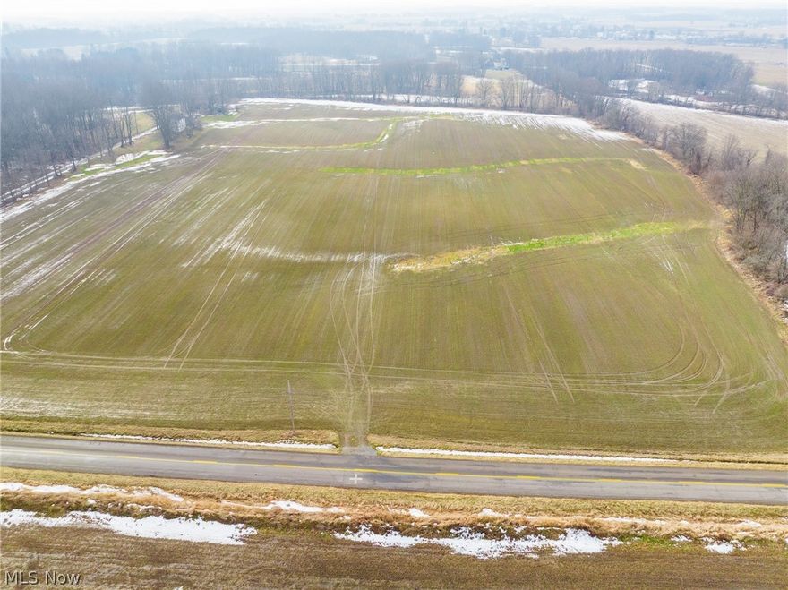 Onsite Live Auction Saturday, March 28th at 11:00 AM. 6.7 acres of land with 293’ frontage on Doylestown Rd, perfect for your home or business with enough room for your 4-H project or buy with Parcel 2 and 3 and have a mini farm.