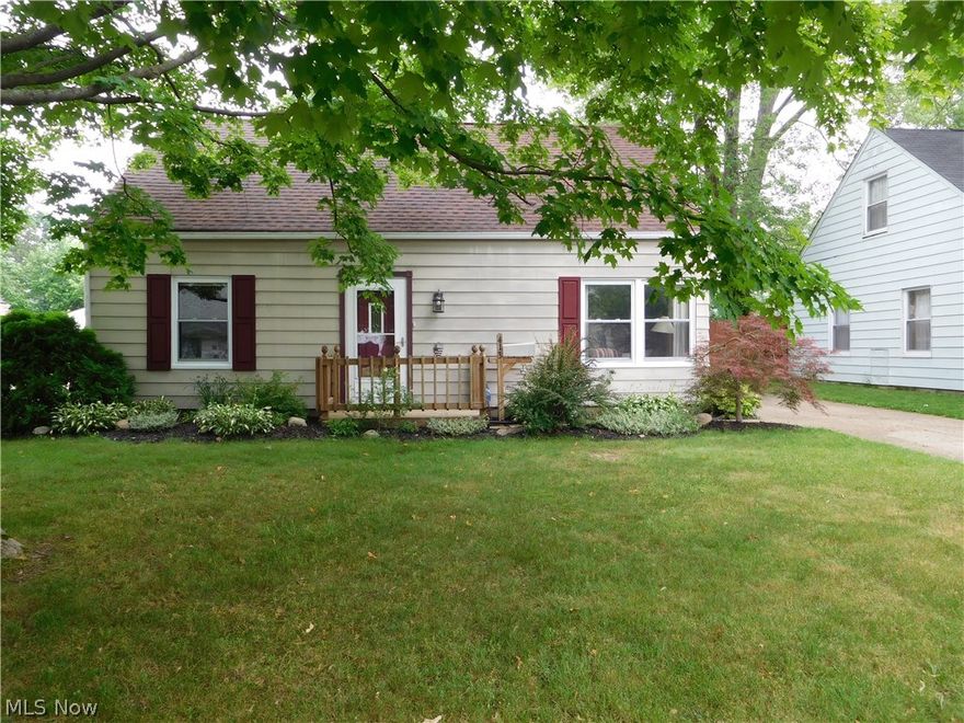 Great starter home in the heart of Cuyahoga Falls within minutes to Portage Crossings, the Natatorium and park!  Spacious living room with oak fireplace and neutral paint.  Kitchen with bright white cabinets, pantry and peek out opening to enclosed sun room.  The back sun room is an extra bonus and provides additional living space, it's currently used for dining but could be an additional family room, play area or for recreation.  Sliding door on sun room leads to awesome deck w/built in brick fire pit and patio.  Two bedrooms on first floor complete with ceiling fans and a full bathroom.  Upstairs is a HUGE master bedroom with plenty of closet space and a convenient 1/2 bath.  Completely fenced in backyard (fencing even across driveway to keep the furry friends in!)  Detached one car garage.  Move in and enjoy!!