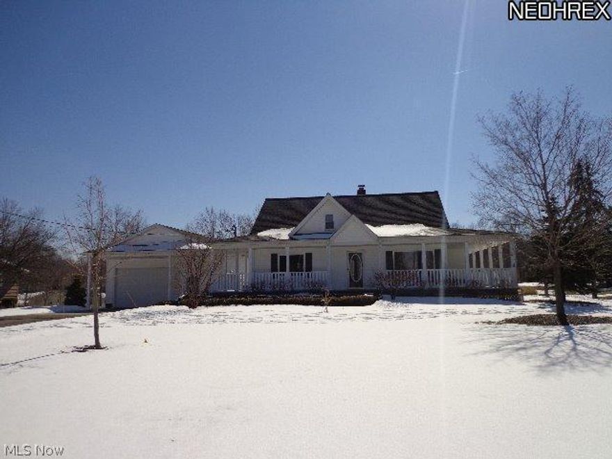 One of a kind property in the premier community of Solon. Nearly four pristine acres and perennial garden with unique decking and stone landscaping in the back yard of this fabulous Cape Cod with wrap around porch. Gourmet kitchen with commercial six burner stove/oven and hood, stylish wood cabinets and solid concrete counters.  Vaulted great room with gas fireplace overlooks the beauty of the grounds. First floor master with full bath and large walk-in closet. First floor office with French doors off the spacious living room with newer wood flooring. Finished walk-out lower level has potential third full bath fully plumbed with a huge shower with multiple shower heads.  Basement can be in-law suite.  Huge garage can easily fit six cars and tons of work/storage space including a FULL bath and a wash basin.  Rear garage door opens to rear grounds. So much more to mention.  Want some land, a huge garage, a unique and comfortable updated home, all in a great community?  Don't miss it!Welc