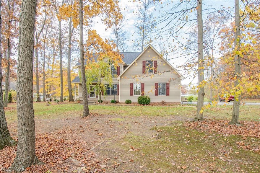 Welcome home to this stunning lakeview retreat! Tucked away on over an acre and accessed by a private road, this property perfectly combines peaceful country living with modern elegance. Step inside the inviting foyer that connects to your cozy living room featuring a gas brick fireplace, and large windows that flows seamlessly into the kitchen and dining area, an ideal space for entertaining or enjoying everyday family life. Sliding doors lead out to the deck, where you can relax and soak in tranquil lake views. Upstairs, convenience meets comfort with second-floor laundry, two spacious bedrooms, and a luxurious primary suite. The owner's suite includes a private balcony overlooking the water, walk-in closets, and an oversized en-suite bathroom with dual vanities. Recent updates include new engineered hardwood floors throughout (2025), fully renovated bathrooms (2025), and a professionally waterproofed basement (2024) with a transferable warranty. Don't miss your opportunity to own this beautifully updated and spacious home with serene lake views; your perfect blend of privacy, comfort, and style.