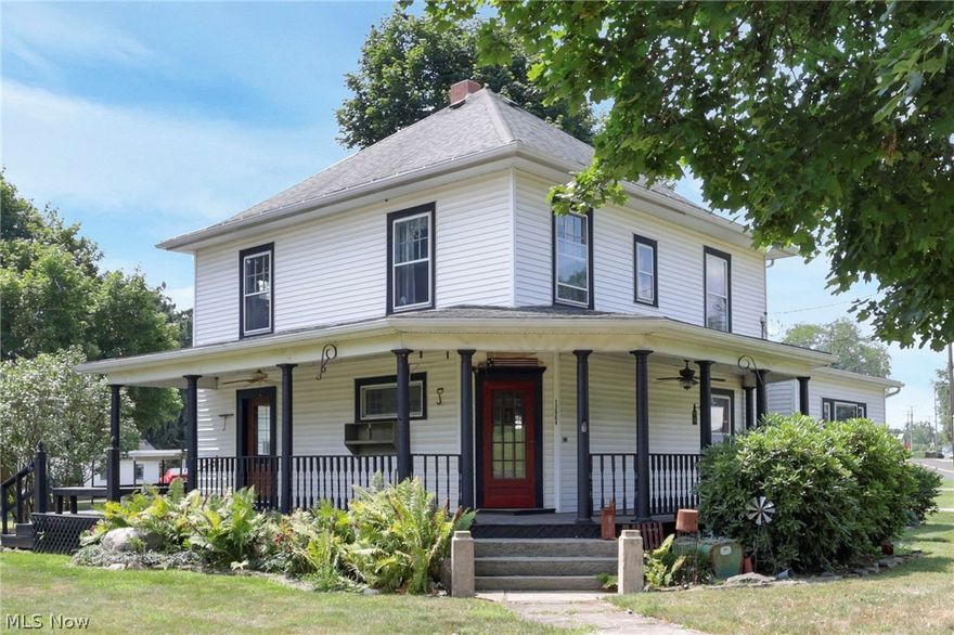 Discover the perfect blend of classic charm and modern convenience in this beautifully updated 1930s country style home. Featuring original hardwood floors, elegant wood baseboards, and stunning stained glass windows, this home seamlessly combines timeless character with contemporary upgrades. Enjoy four spacious bedrooms, including a main-floor owner's suite, and two stylish bathrooms. The convenient first-floor laundry adds practicality, while the wrap-around porch and two-level deck provide ideal spaces for outdoor relaxation and entertaining. Experience the allure of historic elegance with all the comforts of modern living in this exceptional property.