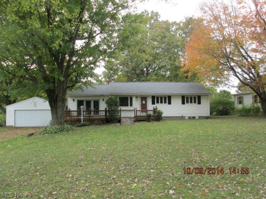 4 bedroom ranch with 2 full baths, deck, covered rear porch, 2 car garage, fireplace & central air.