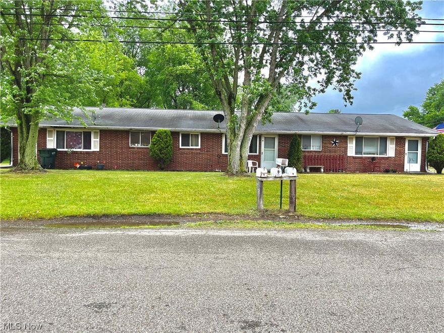 Excellent investment opportunity in Minerva.  All brick one story triplex with plenty of income potential or live in one unit and live payment free.  Great potential for the additional two parcels (9082 and 9088 E Southview St), currently with two mobile homes on them.  Tenants own their own appliances and washer/dryer.  Each unit has 2 parking spaces and in unit laundry.  Apt. A, 2 large bedrooms, 1 full bathroom, new carpet 2022, hot water tank 2015, rent $500.  Apt. B, 1 bedroom, 1 full bath, new furnace and central air 2023, hot water tank 2018, newer windows, rent $450.  Apt. C, 2 bedrooms, 1 full bathroom, furnace 2021, hot water tank 2016, rent $450.  All leases are currently month to month.  Please give 24 hour notice for showing requests.  You don't want to miss out on this opportunity in Minerva!