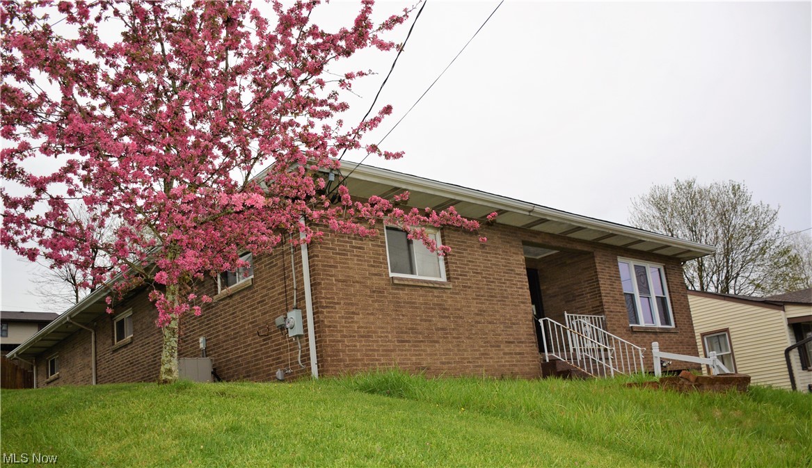 Brick ranch on a full basement. Home features 3 bedrooms, 2 baths on main floor and partially finished basement with a 1-car built-in garage.