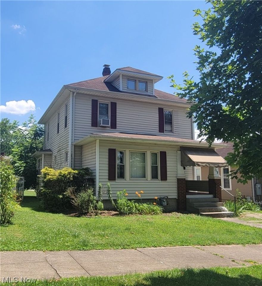 Well maintained 3-bedroom home with original hardwood floors. Half bath on the main floor and full bath on the second floor. Lots of updated over the last 10 years that include bathrooms, windows, etc.. 3 bedrooms on the second floor. The living room and dining room have an open concept. The kitchen is very spacious with a large mud room/ pantry area off the kitchen. Nice little yard plus garage at the back of the property with alley access. Full basement for lots and storage. Attic that could be finished. Nice quiet neighborhood.