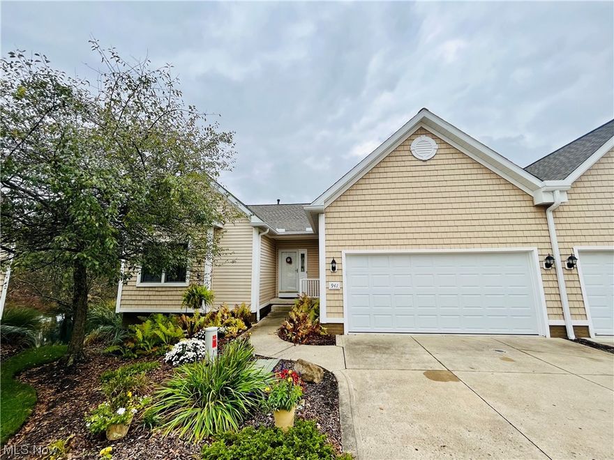 A home like this doesn't come on the market often. Located in the Lakes at Franklin Mills in Kent, this maintenance-free ranch condo is a peaceful oasis! Situated on a cul-de-sac, this home looks out over the water and welcomes an abundance of wildlife. This home offers complete one floor living, with hard surface flooring throughout the first floor. As soon as you walk in, you are flooded with natural light and the view of the pond. The soaring vaulted ceiling in the living room, makes the space feel extremely large and open. There is a dining room and a separate dining space that overlooks the back deck and pond. The open-concept kitchen offers a large amount of counterspace and cabinets and overlooks the entire first floor. The primary bedroom is oversized with a large walk-in closet and full bathroom with dual vanity, walk-in shower and jetted soaking tub. The second bedroom on the first floor is also large and connects to another full bathroom. The large laundry room is also on the first floor, for extreme convenience. There is a beautiful deck off of the main living area that overlooks the water and has stairs down to the backyard. The lower level is finished with a living room and recreation area, along with a full bedroom, full bathroom and wet bar. Additionally, there is an ample amount of storage space and unfinished area. The lower-level walks right out to an oversized patio with covered gazebo and amazing views of the private pond with fountain. Do not miss out!