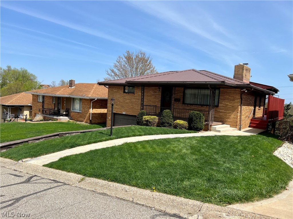 **Adorable brick home** in a wonderful Steubenville Neighborhood, close to schools, hospital, shopping, restaurants, and just about everything you could need. 2 bedrooms, the main bedroom has its own master bath. The eat-in kitchen faces a beautiful deck overlooking trees. Great recreation room with a fireplace. Newer metal roof, sidewalks, man-doors, appliances, as well as a freshly painted beautiful deck. If you are just starting into homeownership or maybe downsizing, this home is priced to please!
Call an agent today to view!!