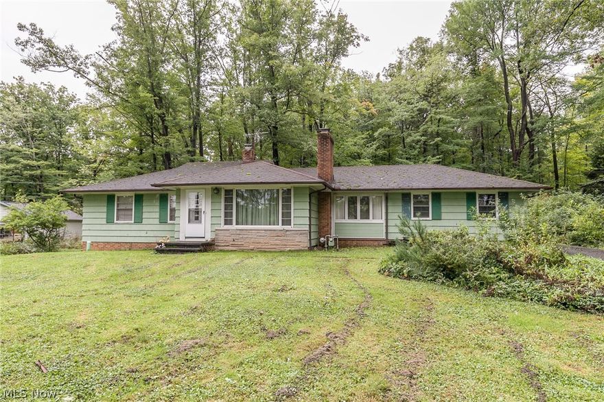 Ranch In Need Of Some Remodeling Resting On 2.27 Acres. Great Room With Fireplace Open To Dining Room. Eat-In Kitchen. Breezeway With Fireplace. Full Basement With Full Bath. Three Bedrooms All With Hardwood Flooring. Attached Two Car Garage.