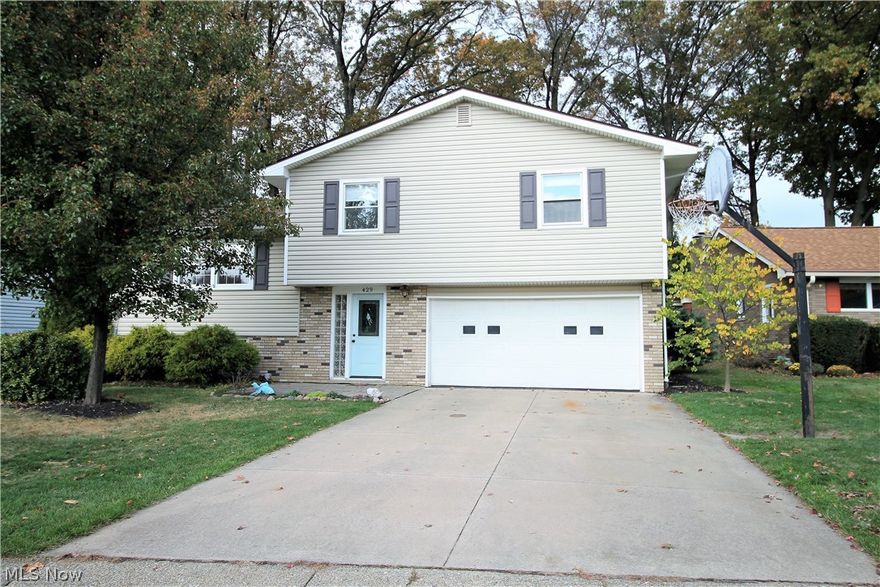 Welcome to this updated four bedroom, one and half bath stylish split level home! This inviting home has a bright comfortable living room with an abundant of windows to let the natural light shine through. New carpet (2016) flows seamlessly to the open dining room and kitchen. The completely remodeled kitchen offers new soft close cabinets, granite counters, stainless steel microwave and fridge, and there is a garden sink with a window above to let the sunshine in. The upstairs has a remodeled bathroom with tile shower and double sinks. There are four bedrooms, all with refinished hardwood flooring. The master suite a and second largest bedroom have double closets. The completely refinished lower level has a large functional-style recreation room, great for entertaining, a second room which can be used for an office, play room, etc., and laundry rom with brand new Lennox furnace and A/C (Aug 2019) with transferable warranty and the waterproofing in the lower level has a lifetime transf