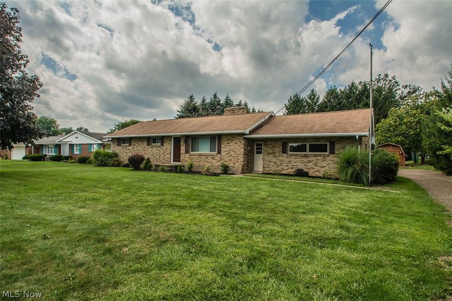 Enjoy one floor living in this amazingly updated all brick ranch.  Too many updates to list them all which includes new windows and doors, furnace and air conditioning, new plumbing and drains, new wood flooring and carpet.  Beautiful kitchen with new stainless steel appliances and new bath with convenient first floor laundry.  Enjoy relaxing on your rear patio which leads to large backyard. This home is a true must see!