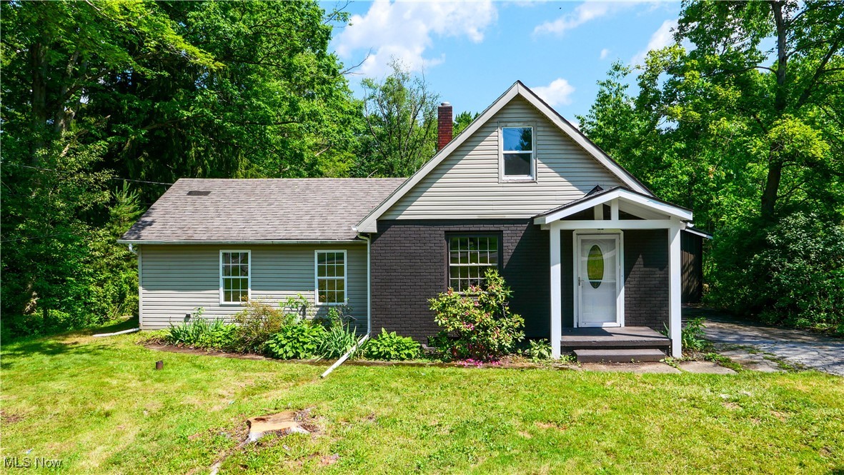 Check out this recently remodeled cape cod in Girard! The kitchen has been updated with all new title flooring, white cabinetry, countertops, and all new stainless steel appliances. New hardwood flooring and new lighting has been placed throughout the living room, dining room, and bedrooms. The bathroom has been updated with all new tile flooring and a beautiful wooden vanity. The upstairs bedroom could be split into two separate bedrooms making a 4th bedroom, or used as one. The dining room is large enough for family dinners, and the back porch is perfect for grilling for a cookout. Come and make this your home today!