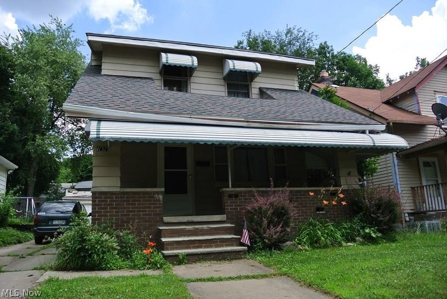Tenant occupied - three bedrooms on second floor, full bath in basement. Two car detached garage. Built-in's in dining room. Being sold as is.