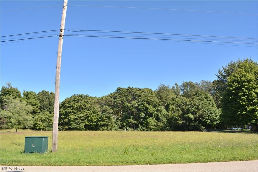 Tired of waiting for the perfect home? Here is a beautiful 1.3 acre piece of property to build your dream home!! Septic is already installed on the property.  Utilities at the street include, water, electric, gas and cable.  Located directly across the street from Cleveland Museum of Natural History's Sand Barrens, a 174 acre preserved fossil dune, perfect for hiking!