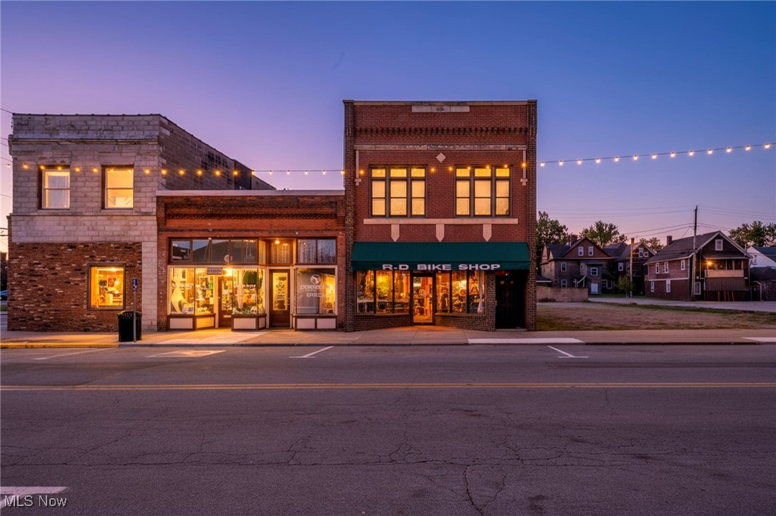 Be part of Barberton’s growth and revitalization with this versatile property located in the heart of the city’s historic district. For 46 years, this building has served as both a home and successful business and is now ready for its next chapter as the sellers retire.
The main level offers an open retail space with its own furnace, half bath, storage area, and rear access, perfect for retail, office, or studio use. Upstairs features a 2-bedroom, 1-bath apartment ideal for rental income or on-site living. All appliances included.
Updates include new roof coating (2023), new water heater (Aug 2025), and a resealed two-tier deck (2025). Off-street parking adds convenience. Property is being sold AS-IS and is pending auction in mid-January 2026. Sellers will review offers prior to auction. Don’t miss this opportunity to invest in a growing community! Contact us or your agent for a 3D walk through! Feel free to contact Barberton Community Development Corporation for grant & financing options. Schedule your private tour today!