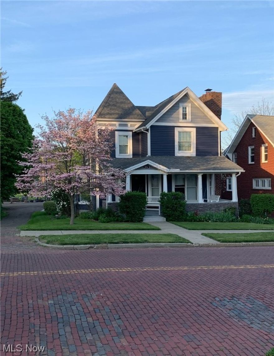 Step into the enchanting embrace of history with this 1880s Victorian treasure in downtown Canal Fulton. A symphony of original woodwork, two sets of pocket doors, bay windows, and a captivating wood-burning fireplace with a built-in blower awaits. Revel in modern indulgence with updates galore, from a new furnace and central air conditioning to a remodeled kitchen and main bathroom, and a built in closet in the primary bedroom. The charm extends beyond with new entry doors, siding, gutters, gutter guards, fence, and a welcoming concrete driveway. Tankless hot water tank & shower in basement updated in 2020. An attached oversize garage beckons. Located just two blocks away from the vibrant heartbeat of downtown, offering easy access to the allure of shopping,great restaurants, the inviting library, and the scenic Erie Canal towpath. Immerse yourself in this timeless haven where history meets contemporary comfort. Kitchen cabinets are soft close w/ shelf genie shelves installed in the lower cabinets for easy access.  All updates are listed with dates in binder at the home.