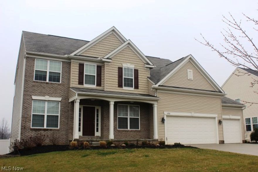 Stunning & spacious 4 bedroom, 2.5 bath colonial built 2011 w/approx. 3112SF above grade living area plus additional 420SF in the finished lower level* Foyer entry w/curved stair case* Open floor plan w/9' ceilings* Stately columns at entrance to Great room w/soaring ceilings & gas log fireplace* Formal dining & living room/den w/crown molding* Gourmet kitchen w/island, desk, granite counter top, Maytag stainless appliances (french door refrigerator, microwave, dishwasher, double oven range), walk in pantry & eating area w/slider to large deck* Wood floors through out lower level except great room & laundry* 1st floor laundry w/LG front load washer & dryer* Spacious master & master bath w/double vanity, soaking tub, & separate shower* 3 additional bedrooms & bath w/double vanity on 2nd floor plus a bonus room (20x15) & loft area* Lower level rec room, light & bright w/large windows & plumbed for bath* 3 car garage & covered front porch* Vinyl fenced back yard* Security system* 6 panel