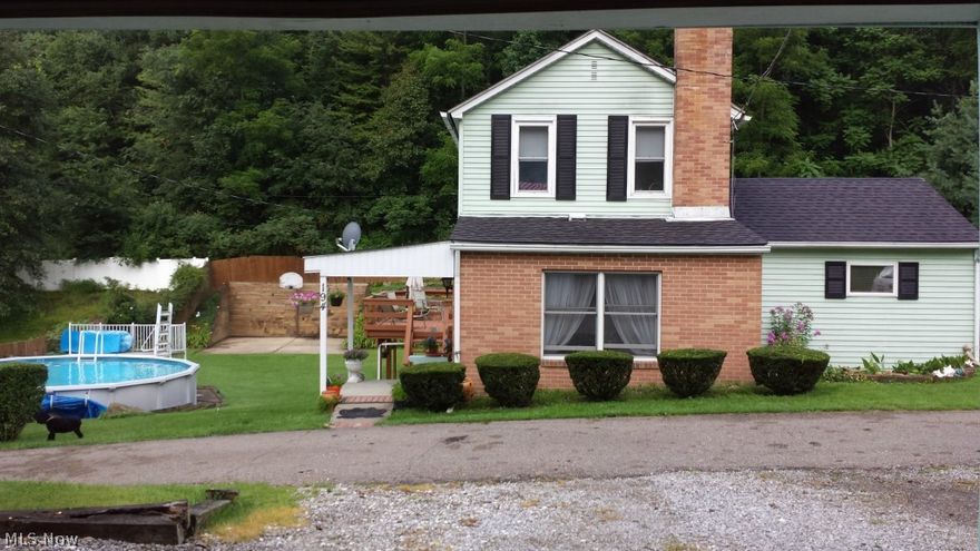 Beautiful 2.3 AC Country Setting. Sparkling above ground pool, with landscaping galore. Lovely wrap around deck. Engineered hard wood floors in Kitchen and office. 3 car garages with workshop on 2nd level. 3 good sized bedrooms to complete the very neat and tidy country home. Aqua Mag water treatment system. Newer septic. Taxes reflect 4 parcels.