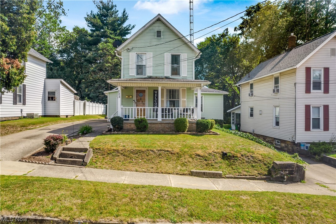 Welcome to this 3-bedroom, 1 1/2-bathroom home nestled in a peaceful neighborhood. As you approach the property, you'll be greeted by a delightful front porch, adding a touch of warmth and character to the exterior. The spacious and bright living room welcomes you with its comfortable atmosphere, offering ample space for relaxation and entertainment. Adjacent to the living room is the formal dining room, which is currently used as an additional living space. The main floor bedroom with half bathroom can be utilized to fit your needs! The spacious kitchen has oak cabinetry and plenty of laminate counter space. A full bathroom finishes off the first floor as you head up the stairs to two bedrooms! In the backyard you will find plenty of space to entertain or just relax on the patio.You do not want to miss out, schedule your showing today!