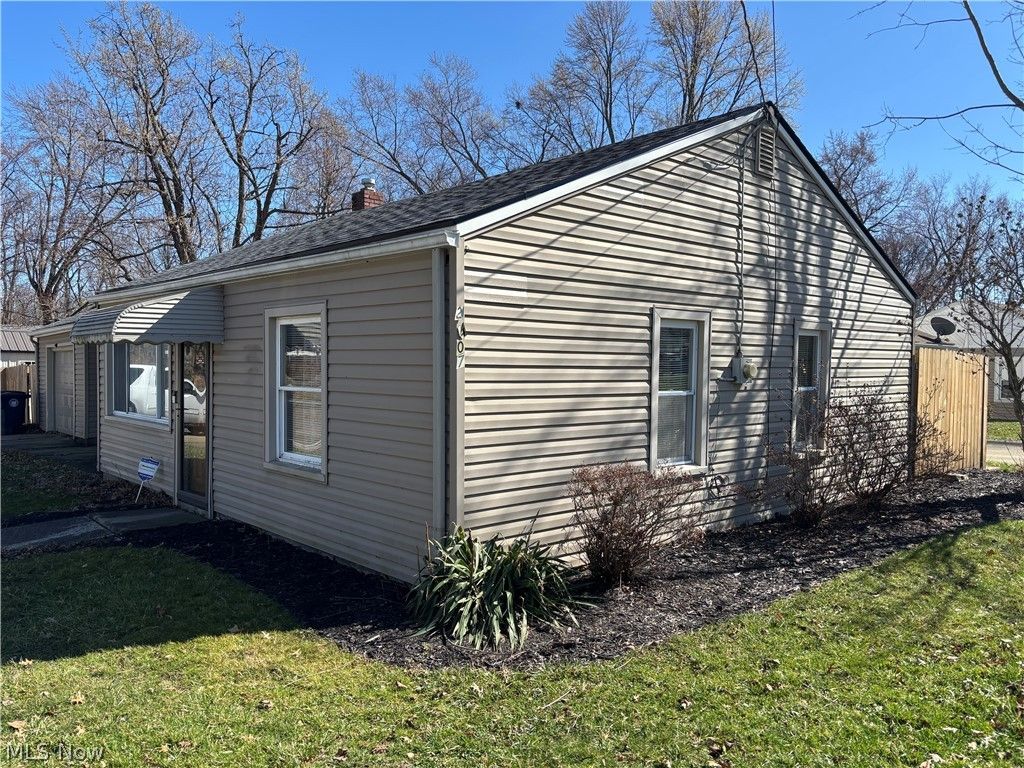 Photo of 2407 Nesmith Lake Boulevard, Akron, OH 44314 (MLS # 5192126)
