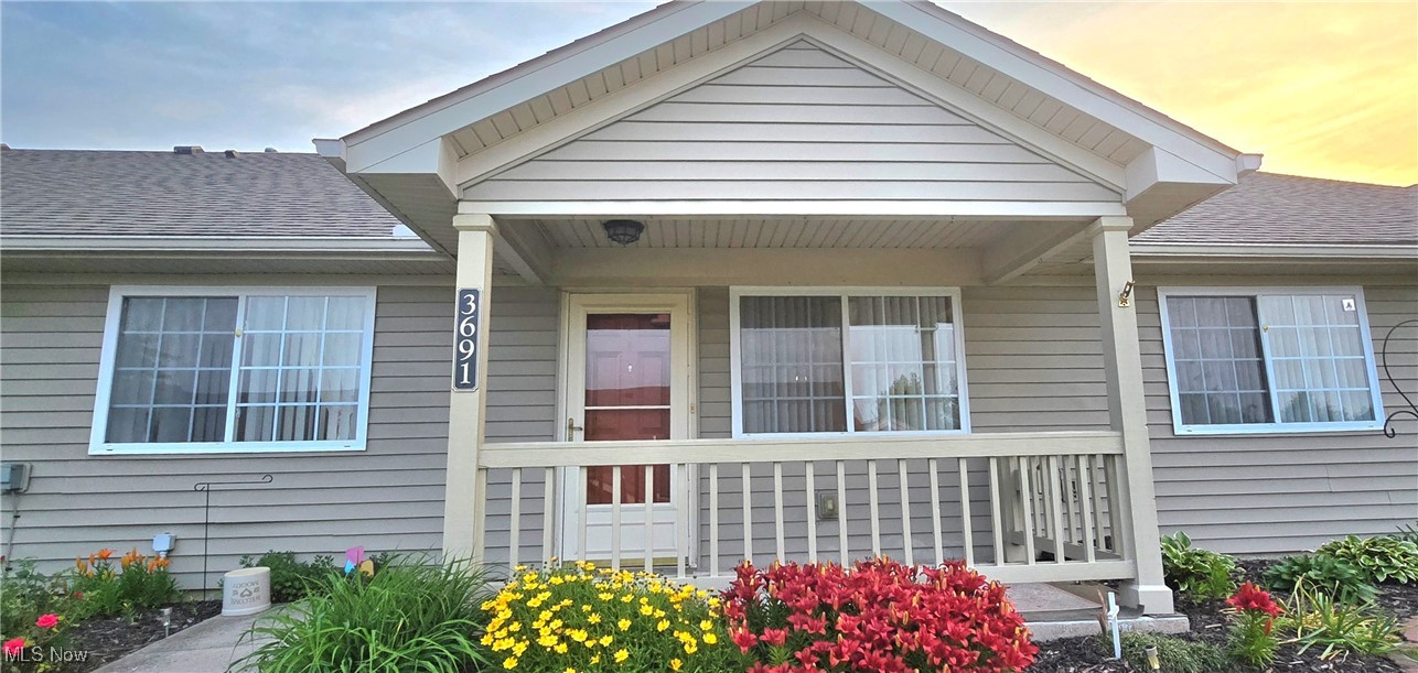 Great 2 Bedroom Condo With Open Floor Plan 2 Full Baths ( 1 with Easy Access Walk- In Large Shower Plus A full Guest Bath with Tub Shower) Small Laundry Room, Split Floor Plan with the Bedrooms on Each Sid of the Great Room for Privacy, All Appliances Stay, Attached 1 Car Garage With Room for Storage, 6' x 12' Covered Front Porch, Unit is in the Center of the Building Which is the Best Location for Low Heat and Energy Cost, Possession at Closing ! Association has a Great Club House with many activities, also available for Big Family Parties of Celebrations. The Colony Condos are Located At On Maple Avenue Right Behind Panera Bread Opposite The Community Bank