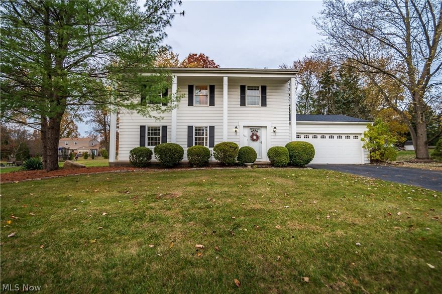 Welcome Home! Located in small town Hudson Ohio, this four bedroom, three bath home is waiting for you! Through the attached two bay garage, you enter into the foyer - hang your coat up and stay a while! You have two closet spaces to keep a tidy look, A half bath is just off the garage, and as you walk through to the right, we invite you into the living room. Picture yourself this holiday season, cozied up in front of that fireplace with your favorite warm beverage as the snow falls. Off the living room you have a deep backyard with enough room to have a garden or hot tub, and two deck spaces for your 4th of July BBQ (the fireworks are hosted at Barlow park, just a block and a half up the street!) Back inside, your kitchen and stainless steel appliances are ready to prepare that holiday meal! A formal dining room is positioned right off of the kitchen and through the french doors, you have a hard wood living space, studio, or additional family room! Up the stairs, there are four nicely