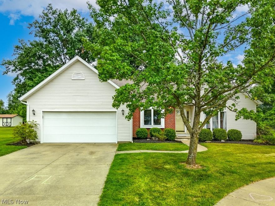 Have you been searching for one-floor living? Look no further! This adorable, well-maintained home offers the privacy and tranquility you've been seeking, situated back on a cul-de-sac and surrounded by a vinyl privacy fence. As you enter, you'll be welcomed by a spacious main living room with large, picturesque windows and a cozy gas fireplace, perfect for ambiance and relaxation. The open layout leads seamlessly into the dining room and kitchen, which features newer appliances and abundant storage. Conveniently located on the main floor is your laundry room, two bedrooms, and a large owner's suite with an ensuite bathroom. The lower level is a blank slate, just waiting for your imagination to run wild. Step outside through the newly installed sliding door off of the dining room and you'll find a deck with a retractable awning, the perfect spot for entertaining The backyard butts up to a field, providing a peaceful backdrop. Don't miss out on this gem—schedule your showing today!