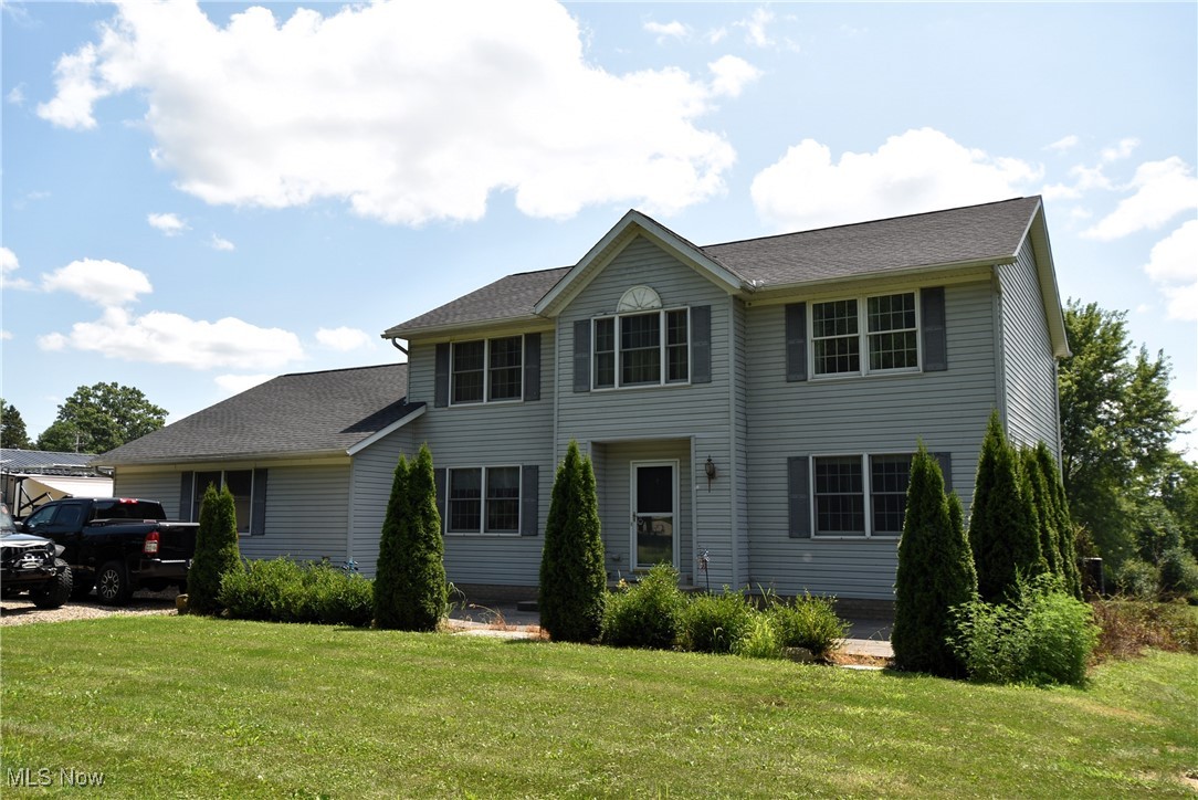 Spacious colonial home located on almost 3 acres. The home features first floor laundry with half bath. Open concept great room with gas fireplace. Plenty of counter space in the kitchen with a larger island. Dont forget to check out the pantry. The unique master bedroom has a large bath with garden tub, walk in closet, and a huge changing room! Survey the back property and stream from the raised deck. Several out buildings including a 20x16 workshop.