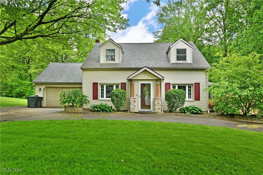 Welcome to this wonderfully updated, 4 bedroom, 2.5 bath home in the heart of Howland! A governor's drive welcomes you as manicured landscaping accent stone and wood accents beckon you inside. Just past the entryway the open concept living area showcases fresh paint, low maintenance wood look flooring, updated lighting and a gas fireplace. The kitchen provides tons of storage space, stainless steel appliances, and a large peninsula with seating! Just beyond the kitchen is a spacious laundry/mudroom which also provides a utility area. A convenient half bath is nearby as well as access to the rear deck. Upstairs is home to an awesome primary suite with a beautifully updated bath with walk in shower and tandem walk in closets! 3 more bedrooms join another full bath to round out this level. Outside, the rear deck is the perfect space to relax on a warm evening. Enjoy the large pergola for some extra shade and the screened porch for quick access to the kitchen. Have a green thumb? You will love the greenhouse just behind the garage to grow vegetables and gorgeous flowers! All of this sits on more than half an acre with quick access to all the amenities. What are you waiting for? Call today for your personal tour!   **Updates: Roof 2024, HVAC May 2025, HWT 2017, Dishwasher 2019, Stove 2025, Primary Suite Bath 2023, Upstairs flooring 2022, Pergola 2020, Fresh Paint on main floor 2025, Second Floor Expansion 2010.**