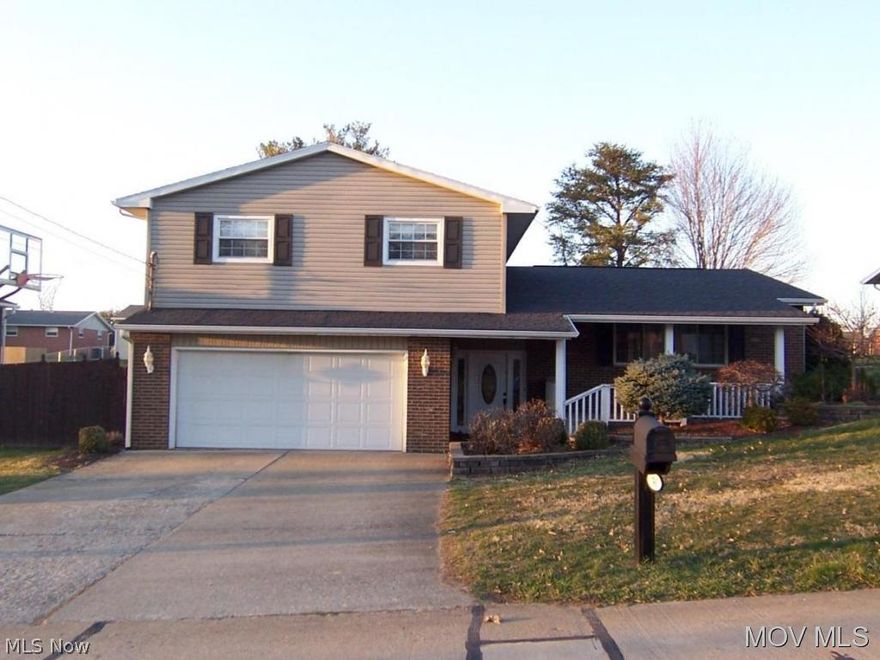 Beautiful curb appeal is just the beginning.  Don't miss the window of enjoying this back yard, along with a gorgeous house.  Tri level with short steps between floors.  Large family room with gas log fireplace and the updated kitchen are open.  All appliances stay.  French doors off kitchen to the most entertaining back deck  surrounding an above ground pool and a fenced yard.  Owner is purchasing a new cover for the frame attached to deck.   Even leaving the trampoline.  Outbuilding with electric.  This house is ready for a new owner and immediate occupancy.  Elem: Blennerhassett Elementary Scho  Elem/Bus: Y  JrHigh: Blennerhasset Jr. High School  JrHigh/Bus: Y  High: Parkersburg South High  High/Bus: Y  Fire: VOL  Police: SHF  ;SQFT=Fin Above:2291, Fin Total:2291, Unfin Above:0;GAR= 2 Car Att, Heated, Opener(s)